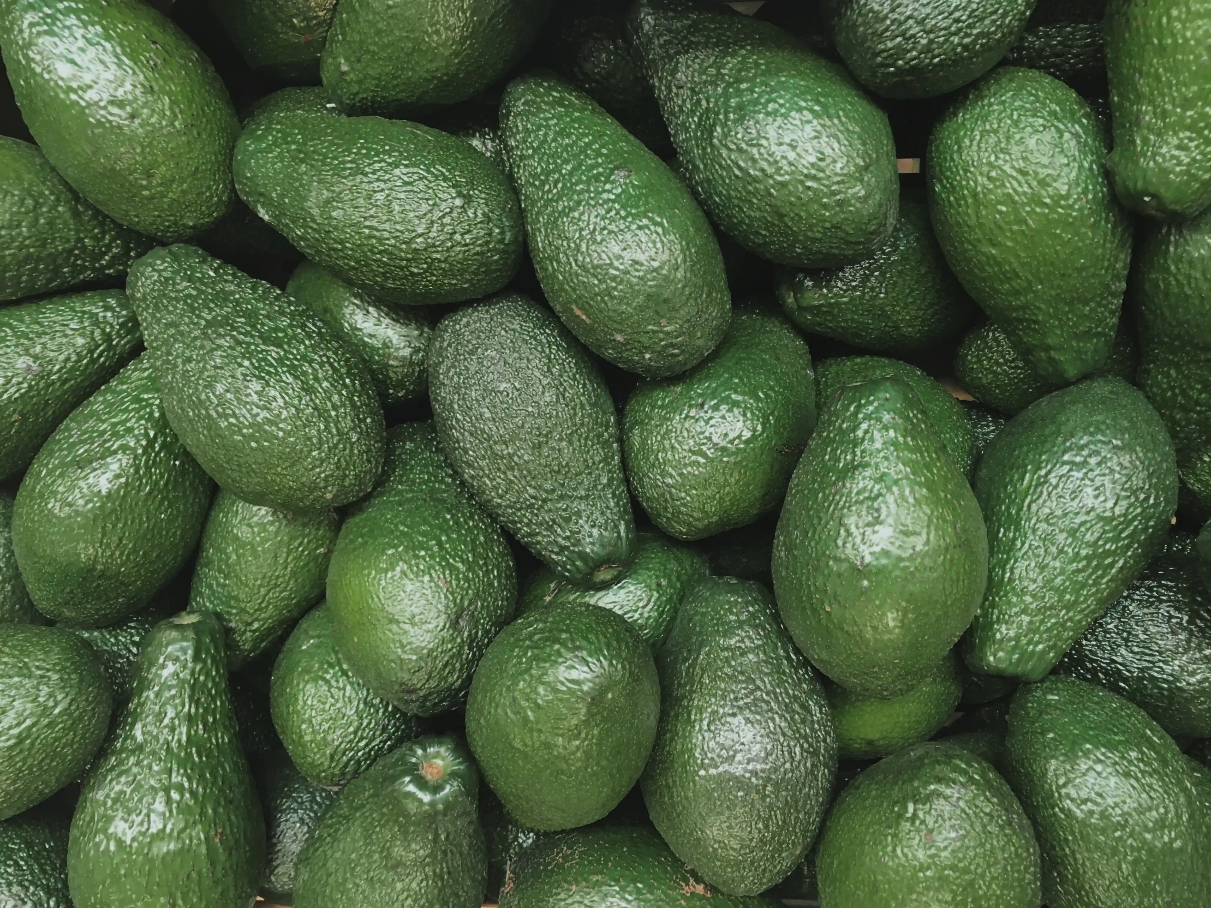a pile of avocado